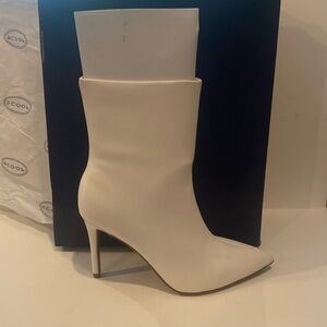 NWT women’s white size 8 mid calf stiletto heels.